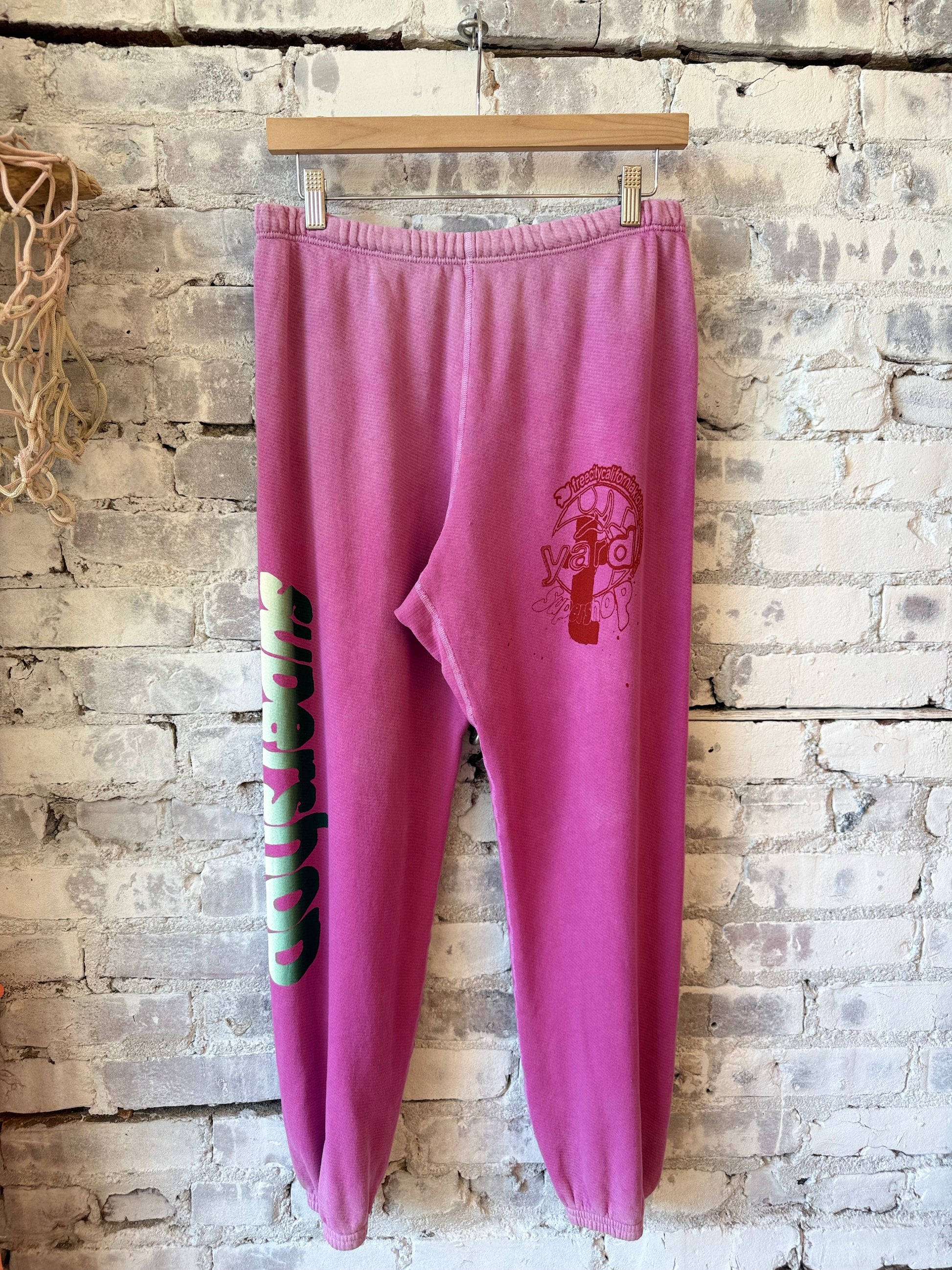 Women's pink SuperVintage Yumm OG sweatpant by Freecity featuring a relaxed fit and comfortable design.