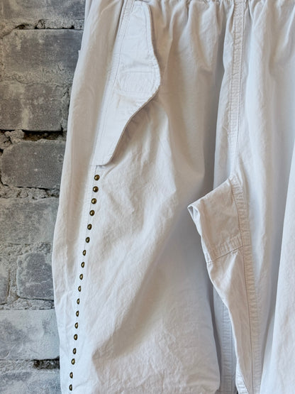 Women's Freecity Homestud Outofsight Poplinair Flapsnap Kite Pant in white, featuring a relaxed fit and stylish design.