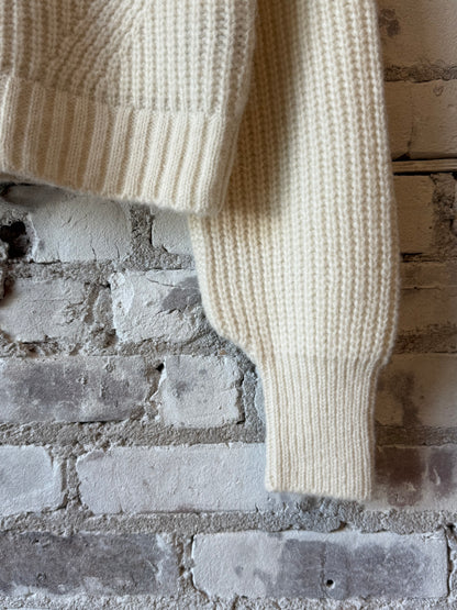 ELEVEN SIX Becca Cardi for women in ivory, showcasing a cozy knit sweater with a relaxed fit and ribbed cuffs.