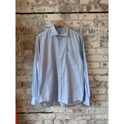 Men's Paul Woven Shirt in Sky Blue by Hartford Men's, shown on a hanger with a close-up of the woven fabric and collar details.