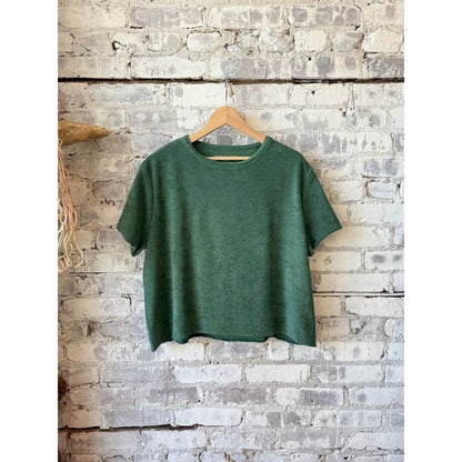 Women's organic cotton terry semi-relaxed crewneck top by Majestic Filatures in agave color, shown on a hanger.