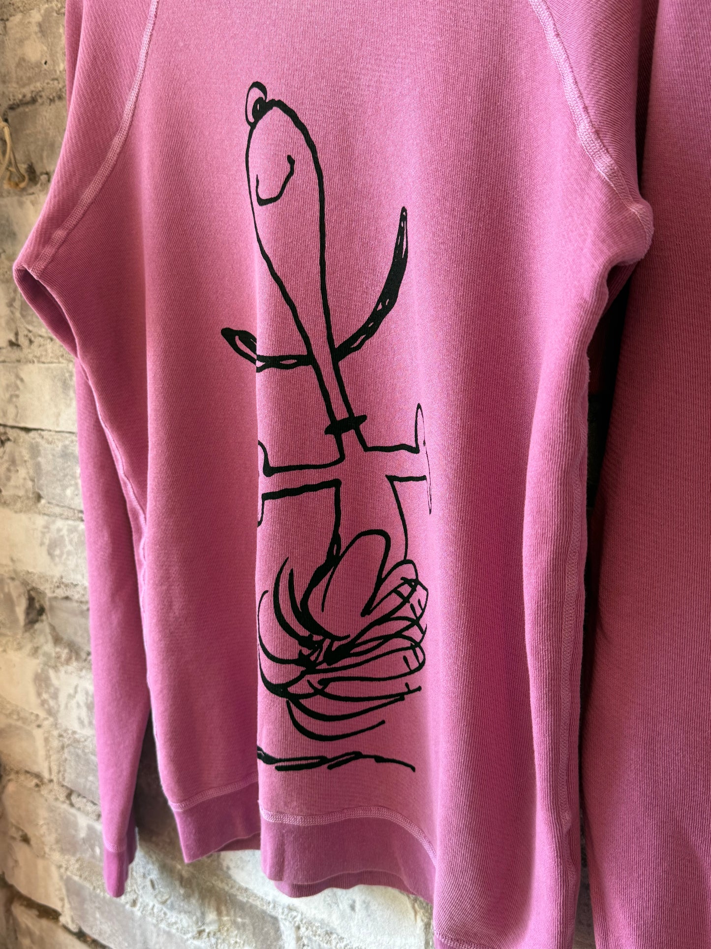 Women's pink Snoopy SuperVintage Yumm Raglan shirt by Freecity featuring Snoopy graphic on soft fabric.