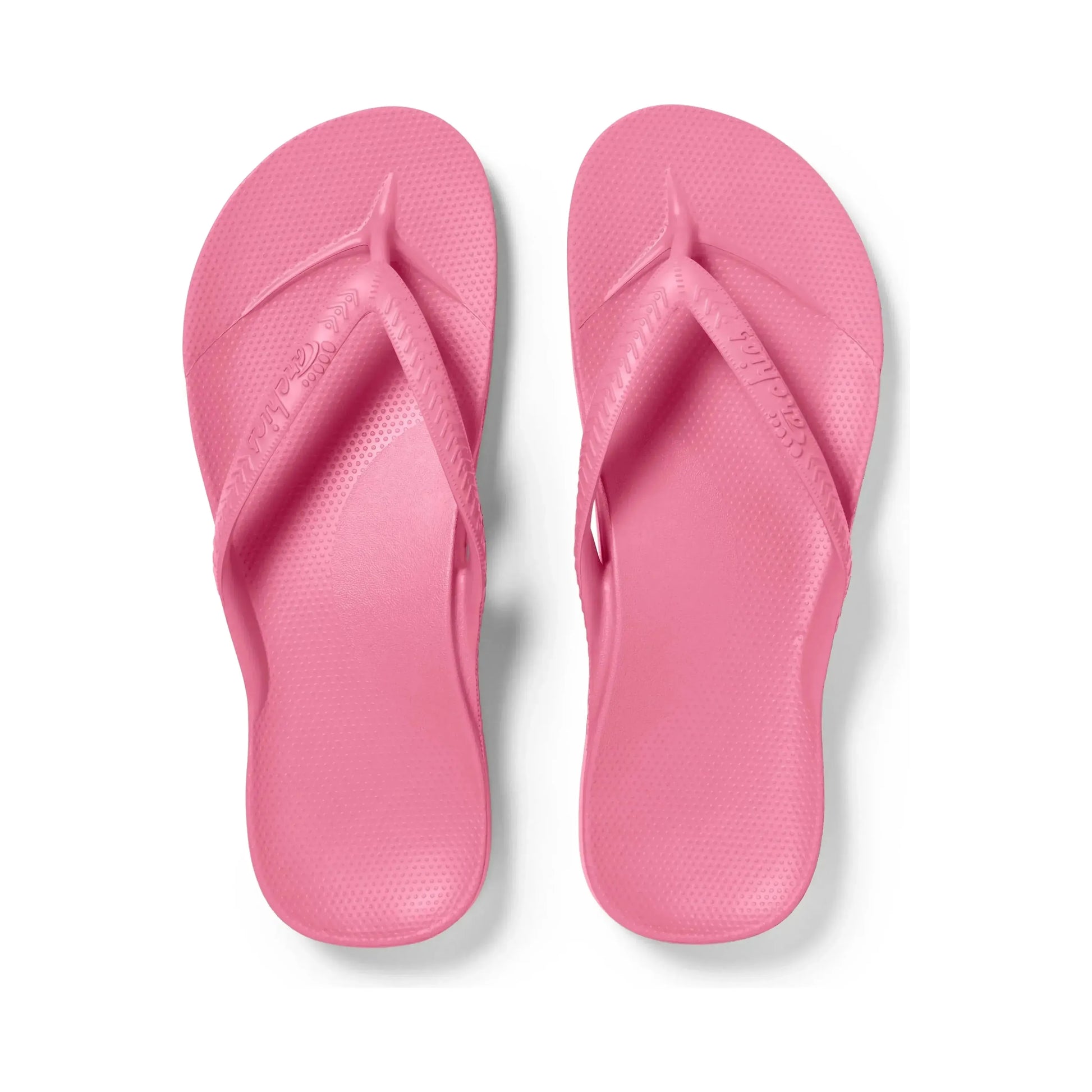 Pink Archies M6/W7 thong footwear with a stylish design, featuring a comfortable strap and vibrant color.