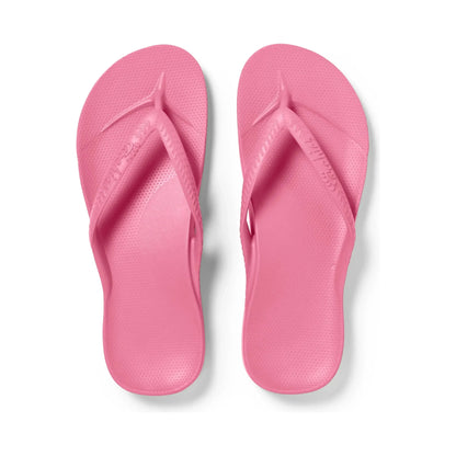 Pink Archies M6/W7 thong footwear with a stylish design, featuring a comfortable strap and vibrant color.