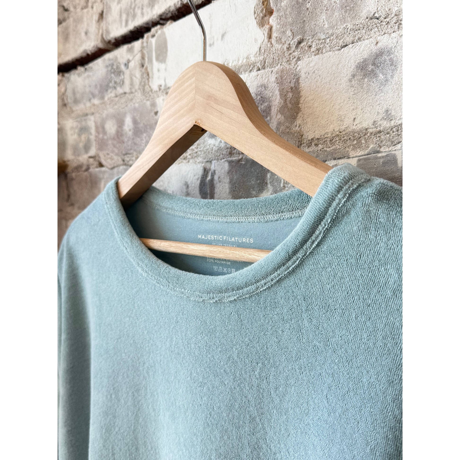 Women's Organic Cotton Terry Semi Relaxed Crewneck in Bleu Calanques by Majestic Filatures, showing the soft, casual fit and fabric texture.