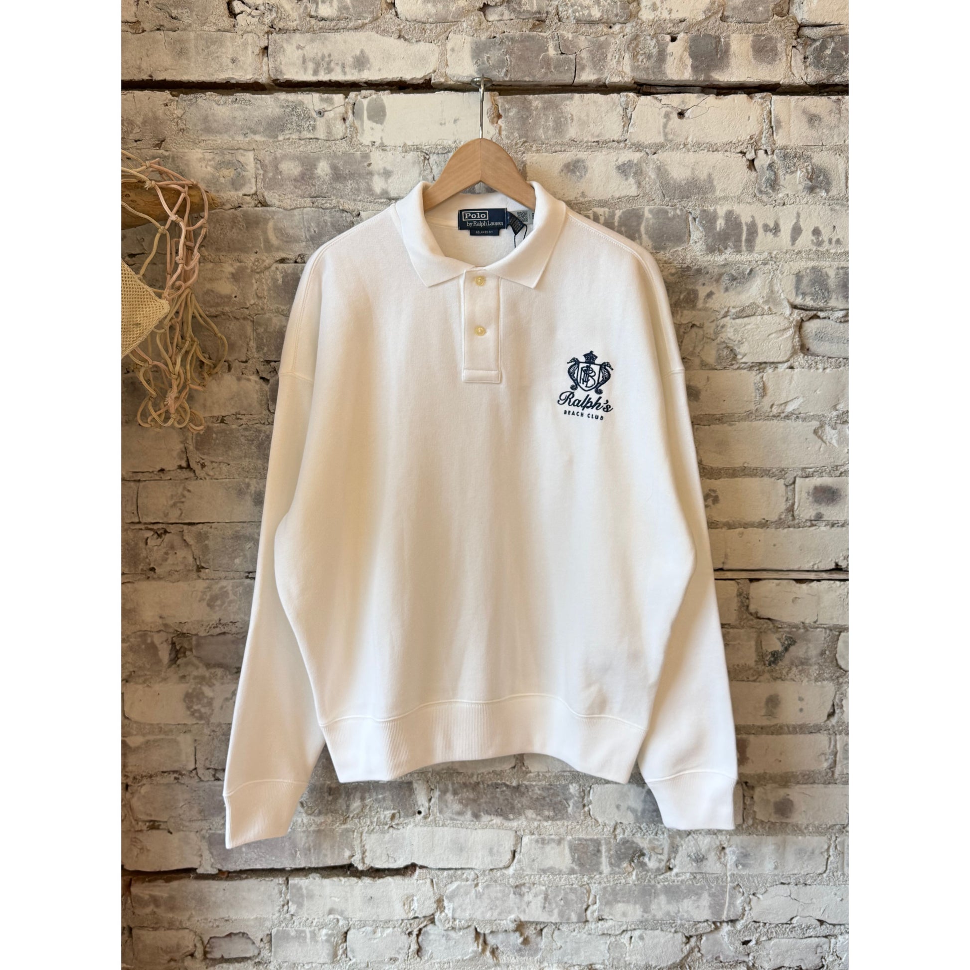 Men's white Polo RL Island Fleece graphic print polo sweatshirt with a relaxed fit and comfortable fleece fabric.