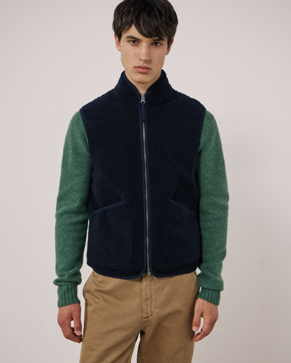 Hartford Men's navy knitted vest, Basta style, featuring a cozy, textured knit pattern and ribbed neckline.
