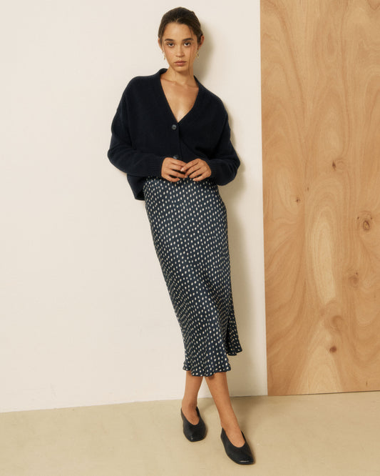 Women's Jimo woven skirt in dark navy and raw white by Hartford Women's, featuring a stylish, textured fabric design.