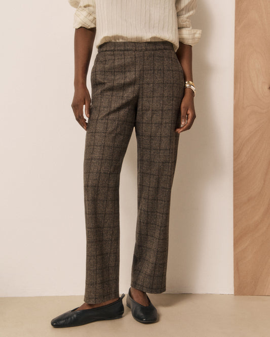 Women's brown woven pants by Hartford Women's, stylish and comfortable, shown on a model in a casual setting.