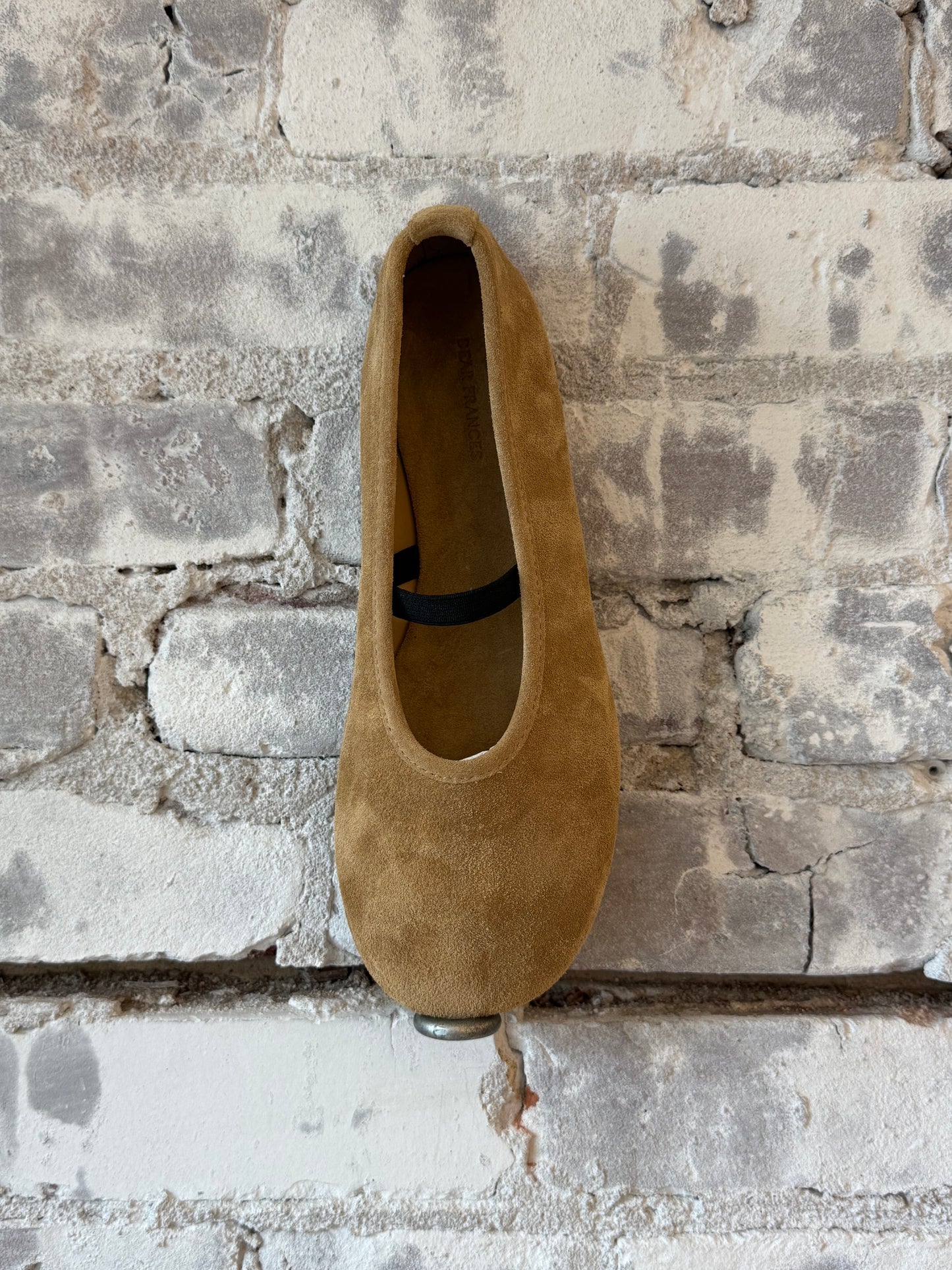Close-up of Dear Frances women's caramel Balla suede shoe with elastic strap showing textured suede and sleek design.