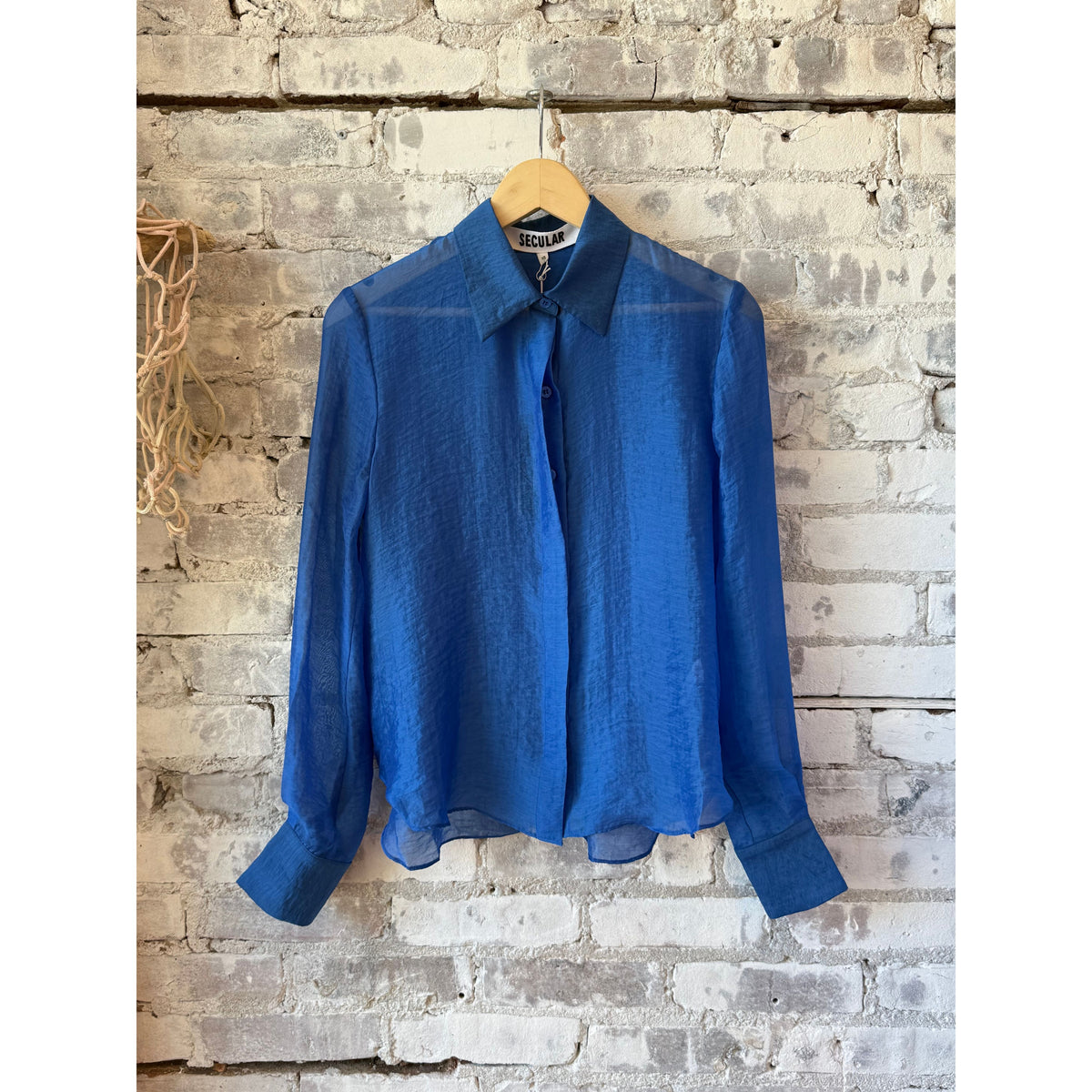Women's Secular Blake Shirt in ocean blue, lightweight fabric with button details and classic collar, stylish and comfortable.