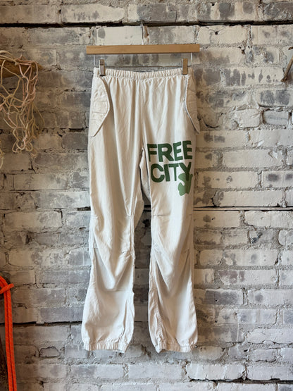 Women's Freecity Airjump Pant in Laundry Green with matte and satin finish, featuring a flap and snap-free design.