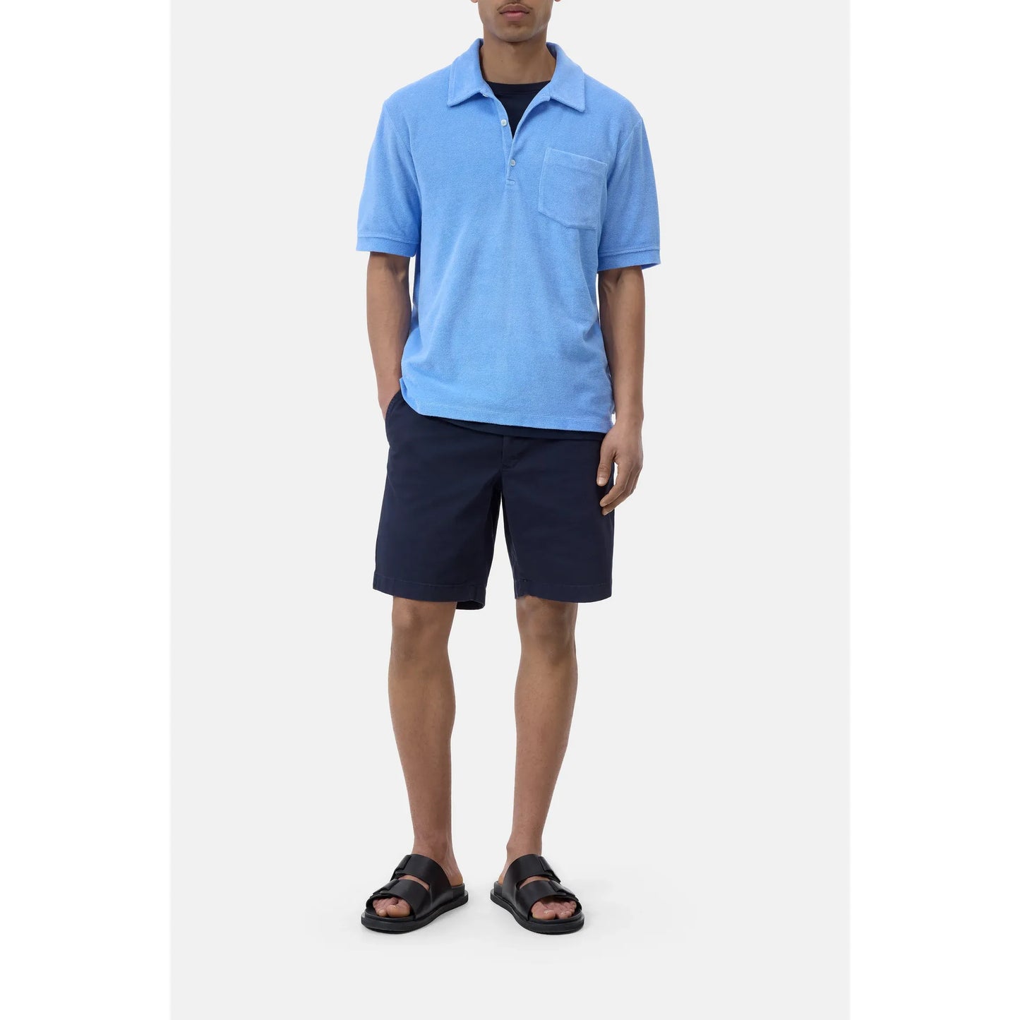 Men's sky blue short sleeve polo shirt by Closed Men's, featuring a classic collar and comfortable fit.