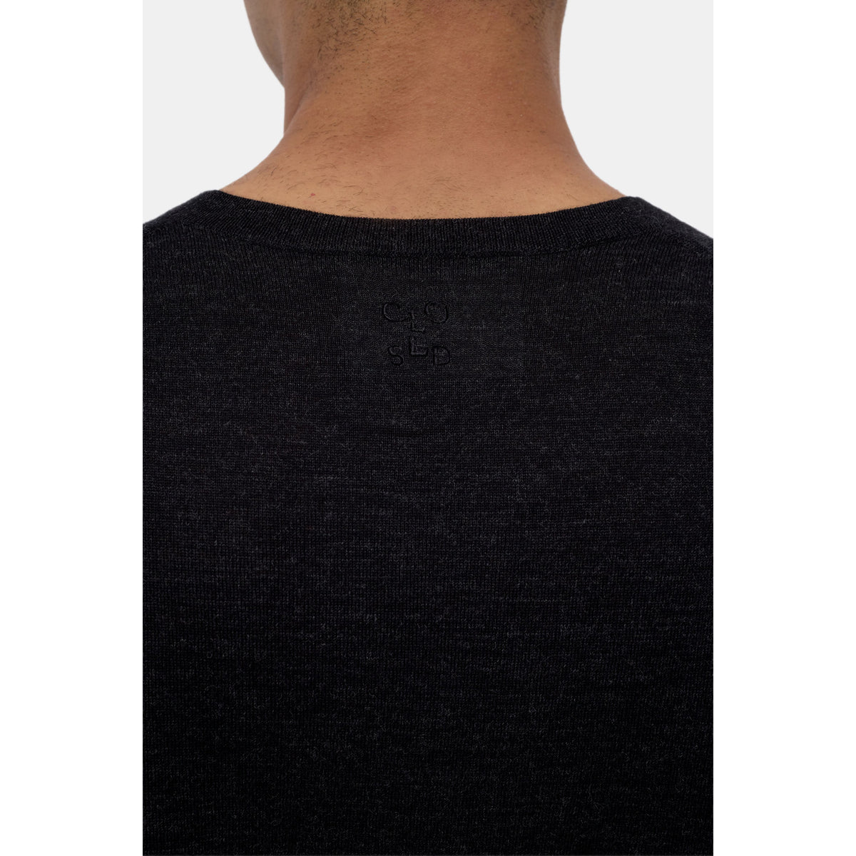 Men's black melange fine-knit crewneck jumper from Closed Men's, showing the soft knit fabric and classic fit.