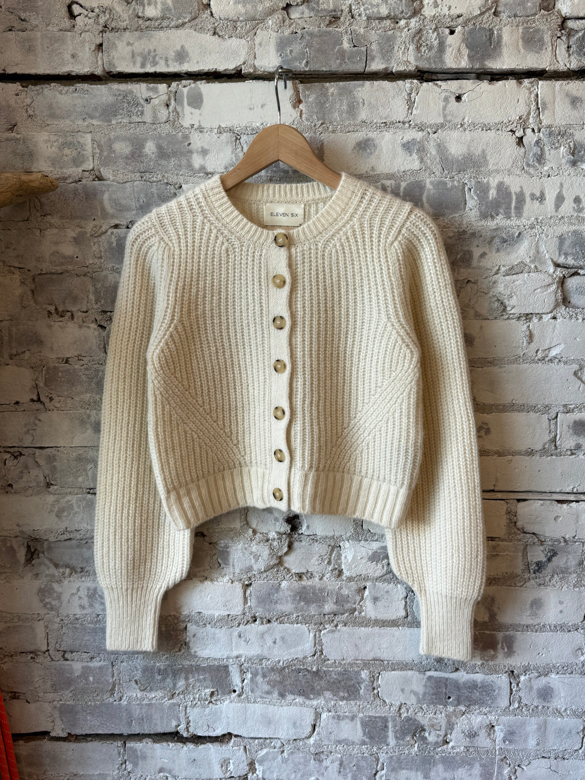 ELEVEN SIX Becca Cardi for women in ivory, soft knit sweater featuring a relaxed fit and long sleeves.