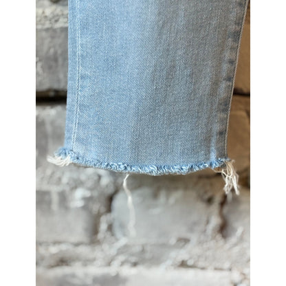 Light blue Closed Women's Baker Slim Jeans, women's denim with a slim fit, showcased on a neutral background.