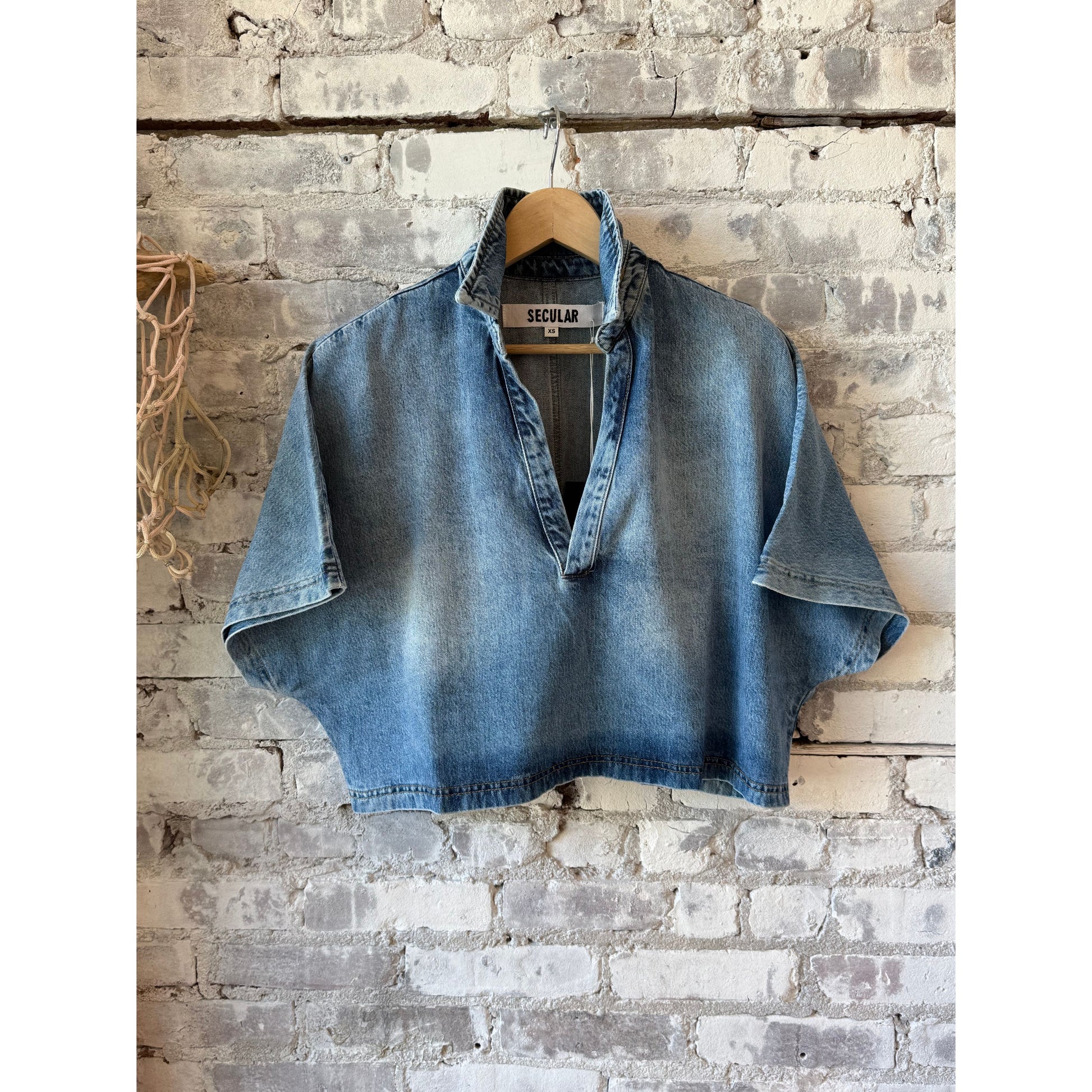Women's Lotus Shirt by Secular in Malibu Wash, featuring a relaxed fit and casual style with soft, worn-in denim texture.