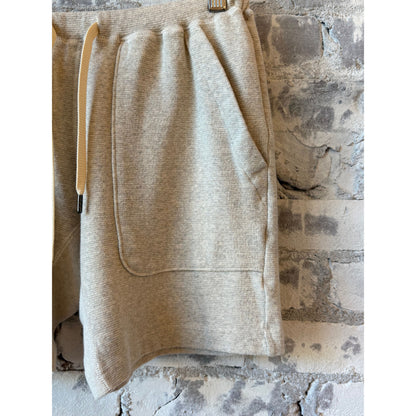 Kepani Raffy fleece sweat shorts in oatmeal color, made of soft, cozy fleece fabric, casual fit, front and back view.