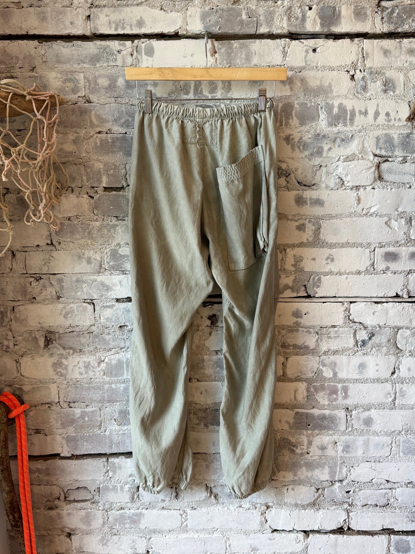 Women's Freecity Airjump pants in silver rock blues with matte and satin finish, featuring flap and snap-free design.
