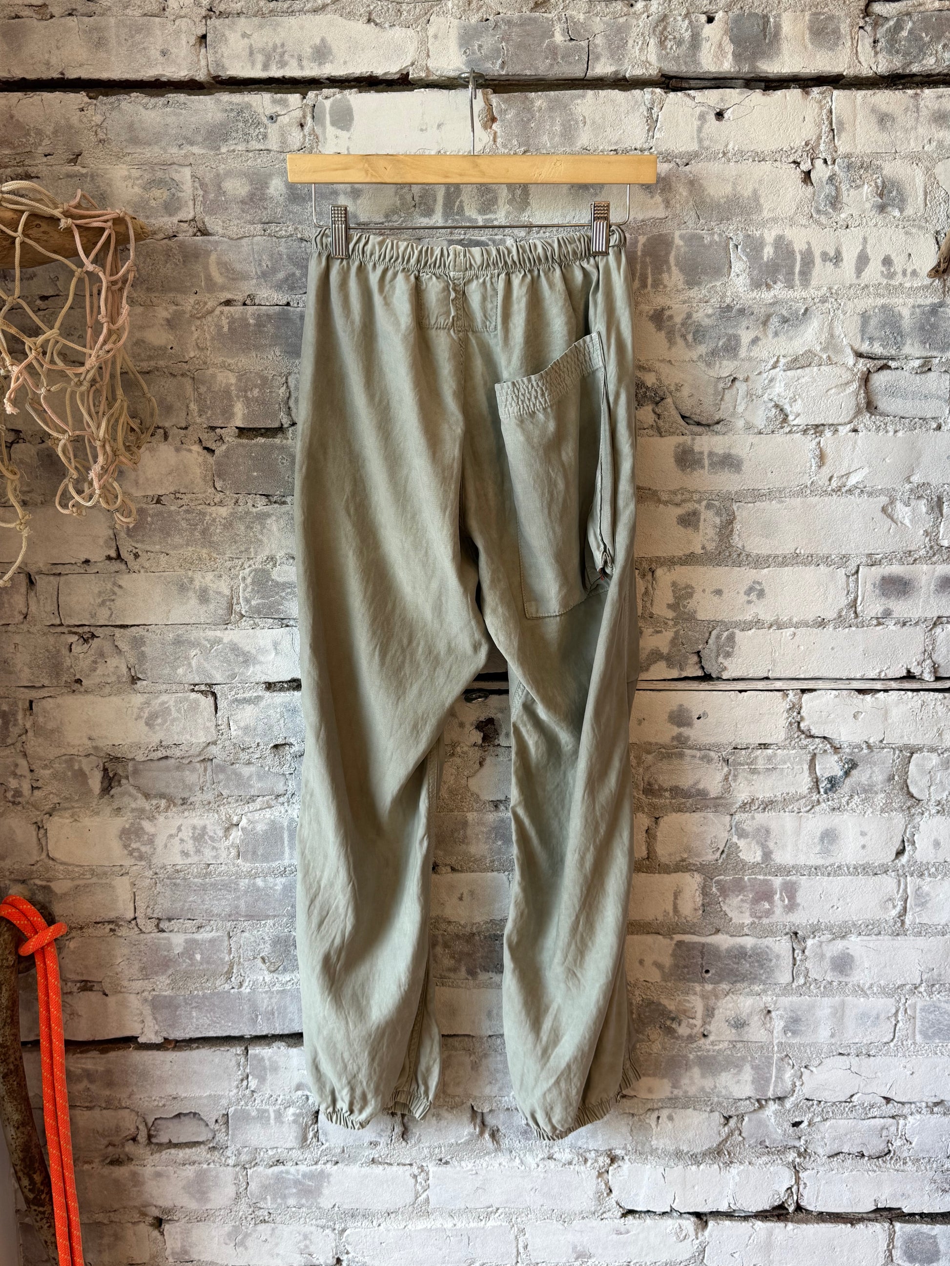 Women's Freecity Airjump pants in silver rock blues with matte and satin finish, featuring flap and snap-free design.