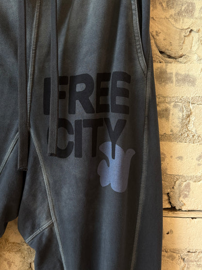 Women's Freecity large Sunfades pocket sweatpant featuring moonshroom design, comfortable relaxed fit with side pockets.
