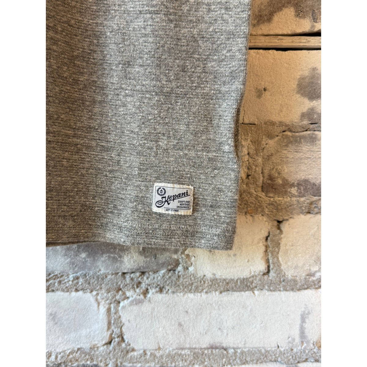 Men's Kepani Raffy Crew Neck SS Sweatshirt in light gray, featuring a comfortable fit and soft fabric for casual wear.
