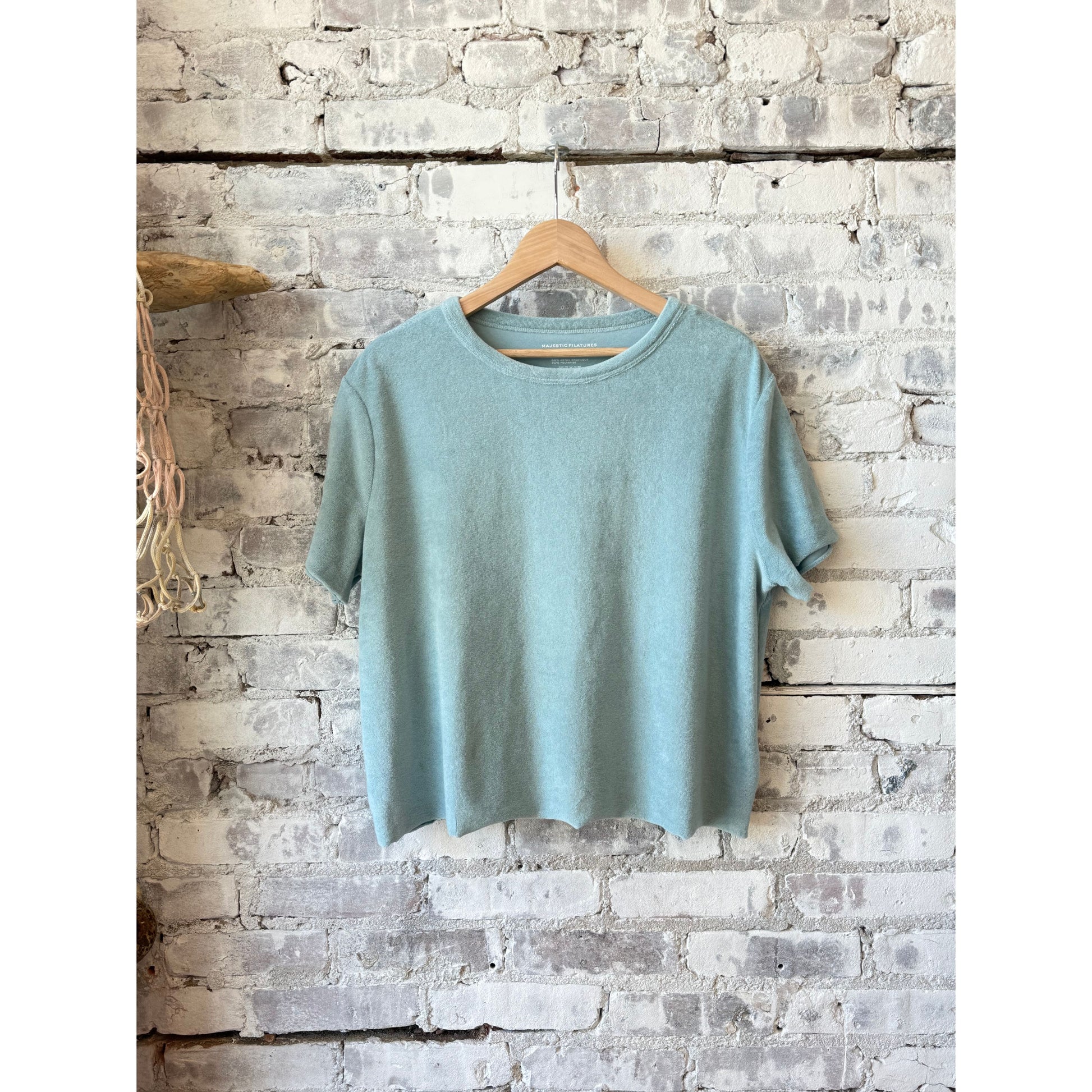 Women's organic cotton Terry semi-relaxed crewneck top in Bleu Calanques by Majestic Filatures, shown in natural fabric close-up.