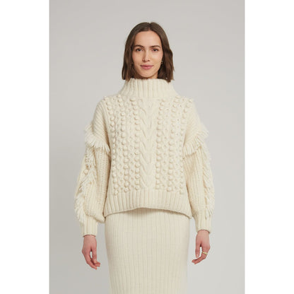 Women's ivory Lyla sweater by ELEVEN SIX, featuring a cozy knit design and relaxed fit, displayed on a neutral background.