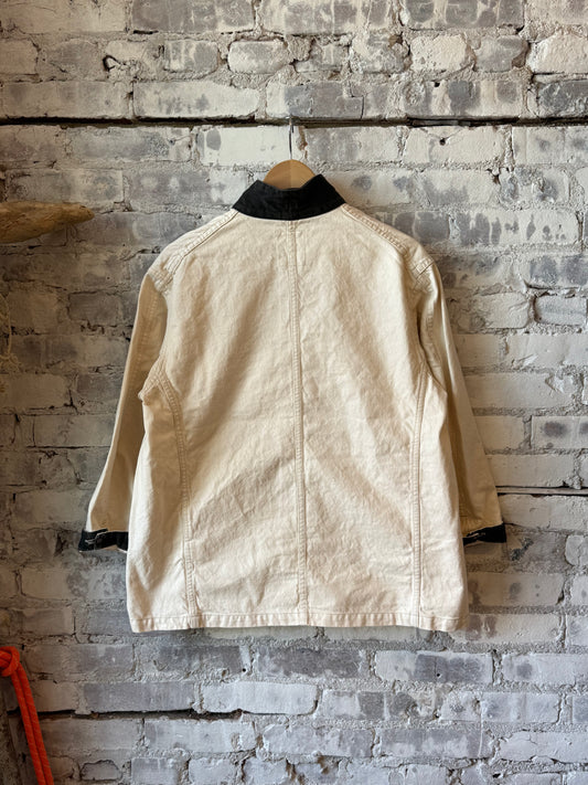 Unisex ivory twill engineer jacket with ivory splatter design, men's style by Chimala, shown in a close-up image.