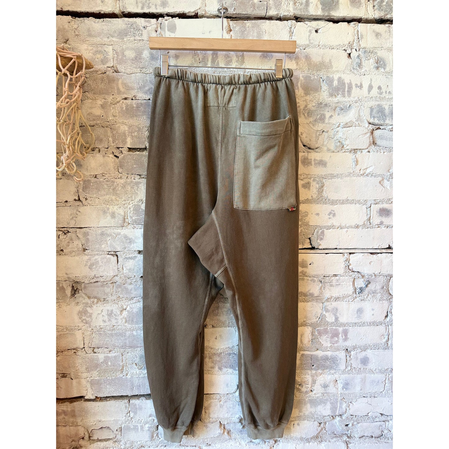 Women's Freecity large Sunfades pocket sweatpant in mud color with side pockets and relaxed fit.