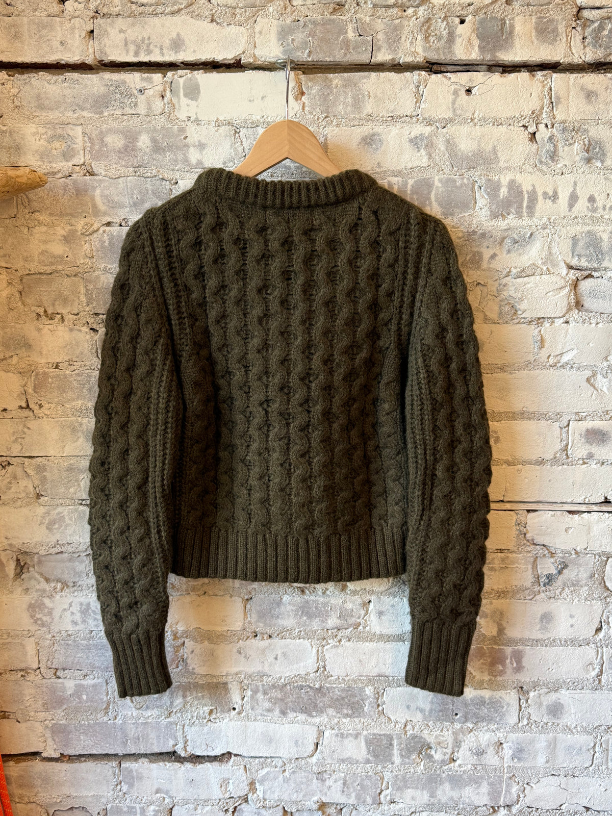Women's Amara Sweater in dark olive from ELEVEN SIX, featuring a cozy knit texture and relaxed fit.