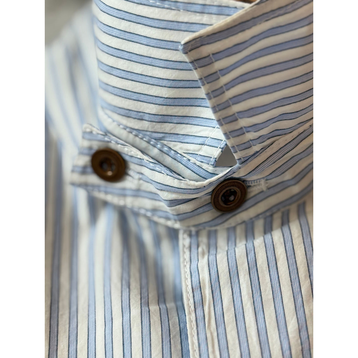 Men's blue Stripe Shirtalls by H-Unit, featuring a casual, striped denim design with front chest pockets and adjustable straps.