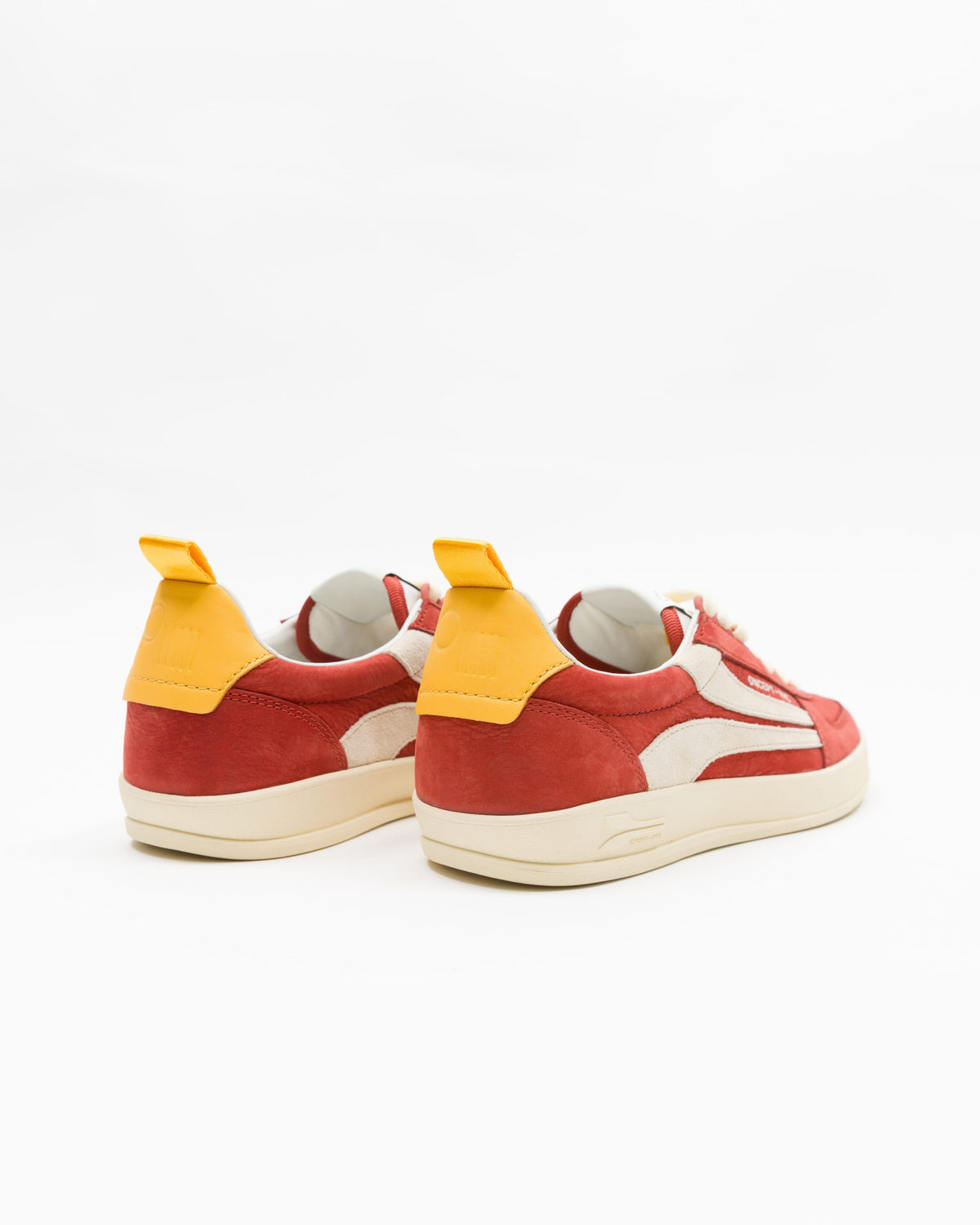 Women's Fez Sneaker by Oncept in retro red, showing the back view with stylish design and vibrant color.