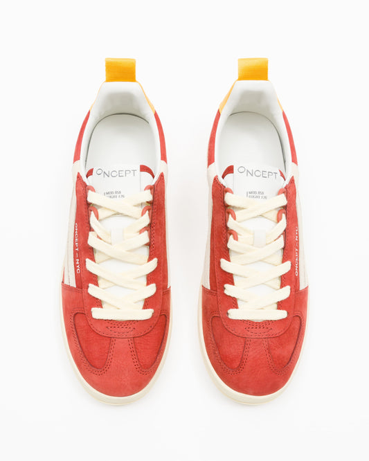 Women's Fez Sneaker by Oncept in retro red with white sole, showcasing stylish casual footwear with a vibrant color.