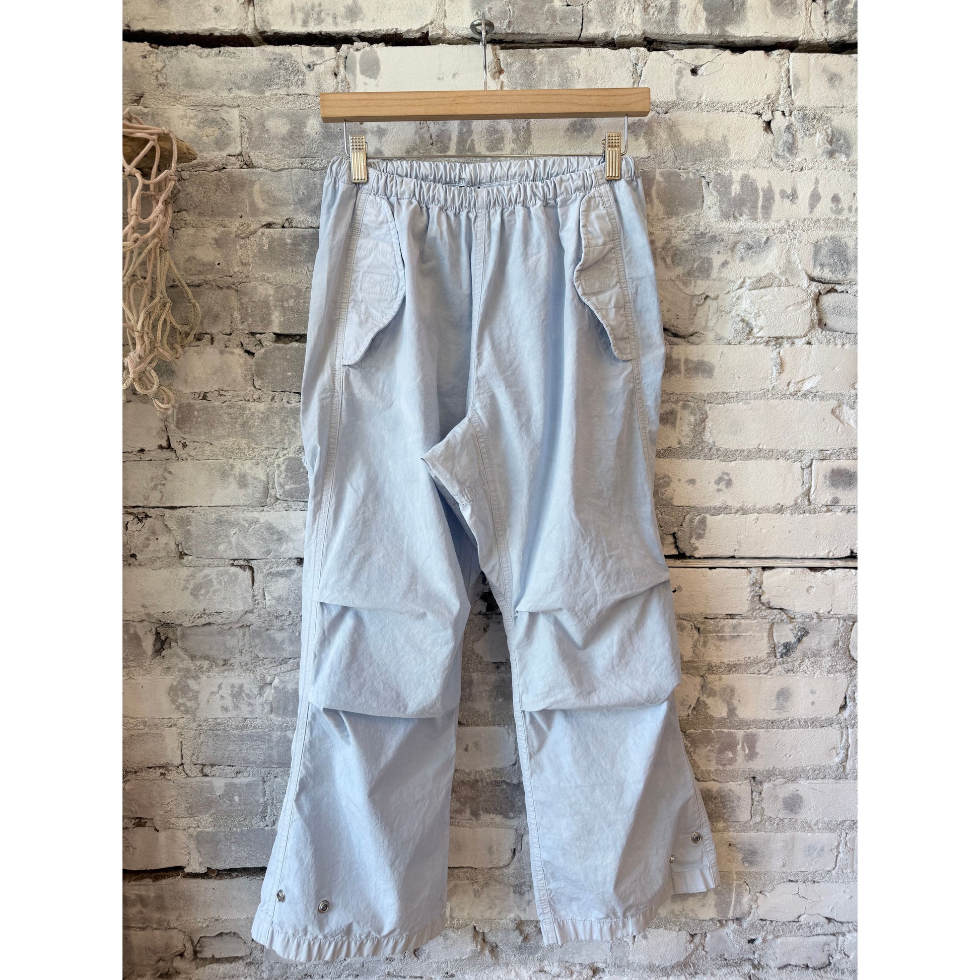 Women's blue Plant print poplin kite pant with air flap and snap closures by Freecity, shown with relaxed fit and stylish design.