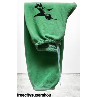 Women's Freecity Sparrow 2005 SuperVintyYumm OG sweatpants in grasshopper powder, with relaxed fit and soft fabric details.