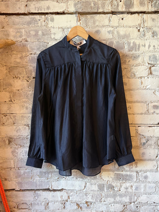 Navy women's Sutton Shirt by Secular, featuring a casual fit and classic collar, displayed on a hanger.