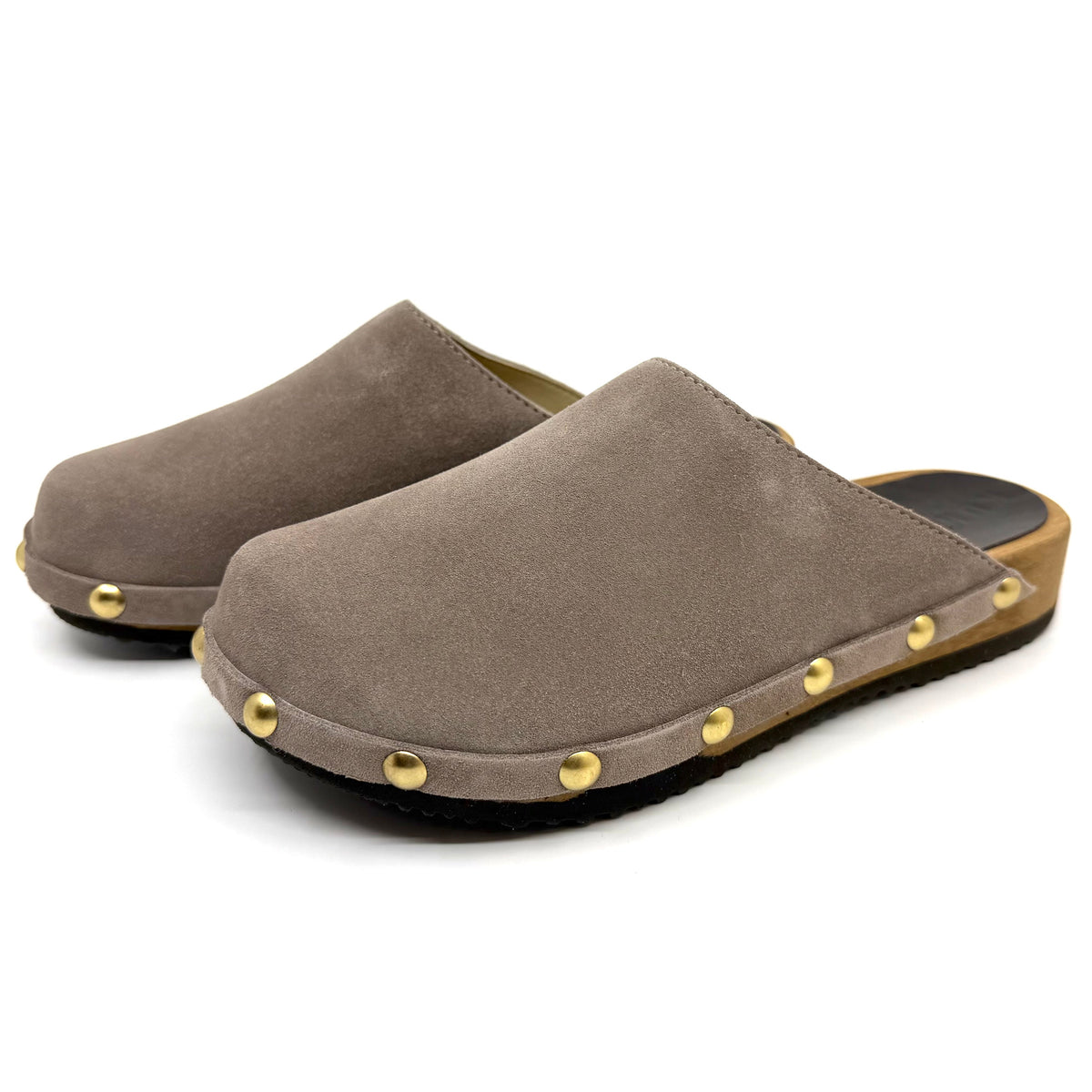 Pair of brown suede clogs with gold studs on a white background