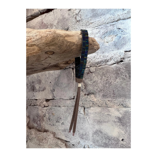 Deep blue Julie Rofman JRC2 bracelet featuring intricate jewelry design with deep blue beads and silver accents.
