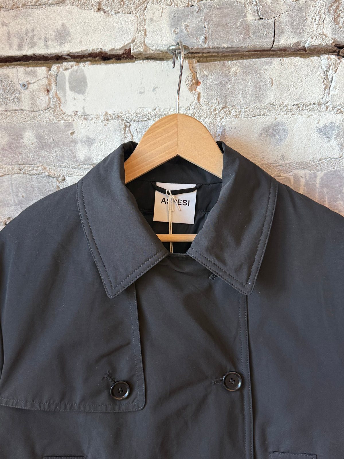 Black women's Scarlett jacket by Aspesi, stylish outerwear with a fitted design and modern details.