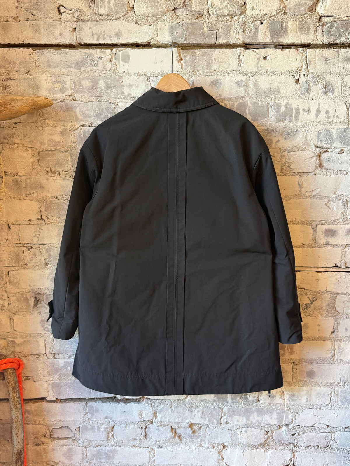 Women's black Scarlett jacket by Aspesi, shown in image with front view and stylish tailored fit.