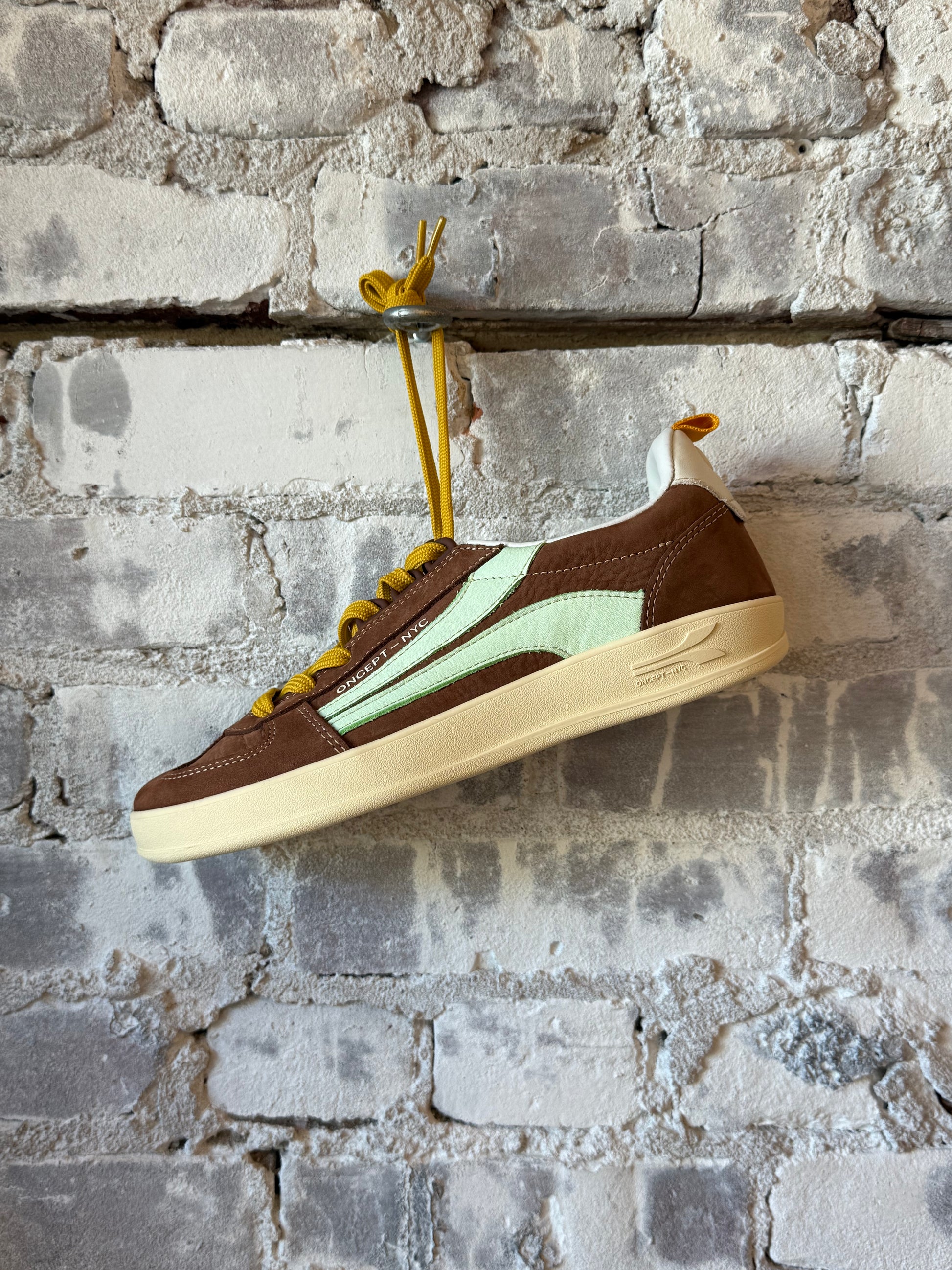 Fez Women's Mocha sneaker by Oncept showing stylish casual sneaker with mocha-colored upper and white sole.