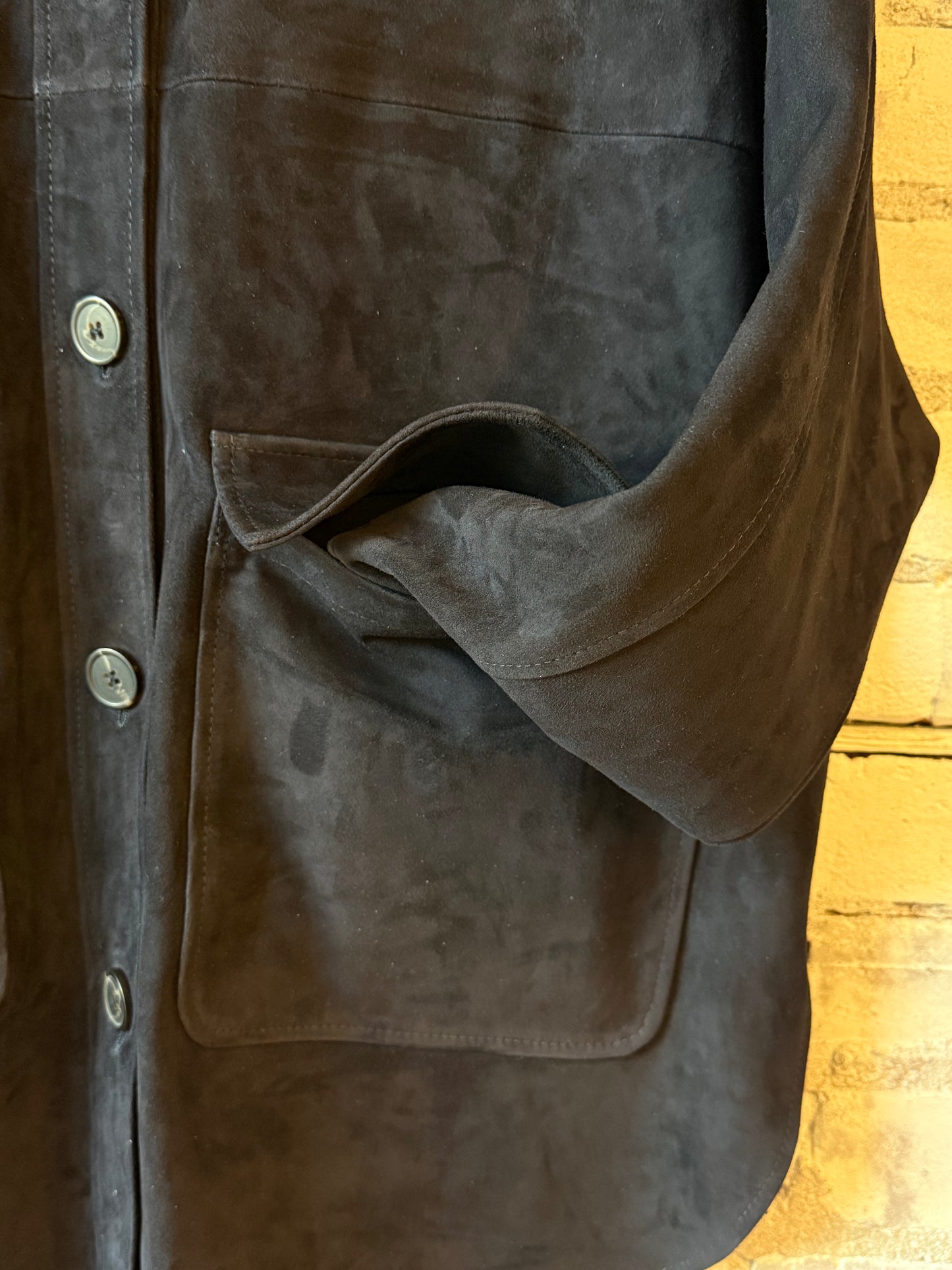 Women's Kaylee Suede Overshirt in dark navy by ARMA, shown in a close-up image highlighting the soft suede texture and tailored fit.