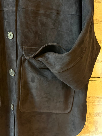 Women's Kaylee Suede Overshirt in dark navy by ARMA, shown in a close-up image highlighting the soft suede texture and tailored fit.