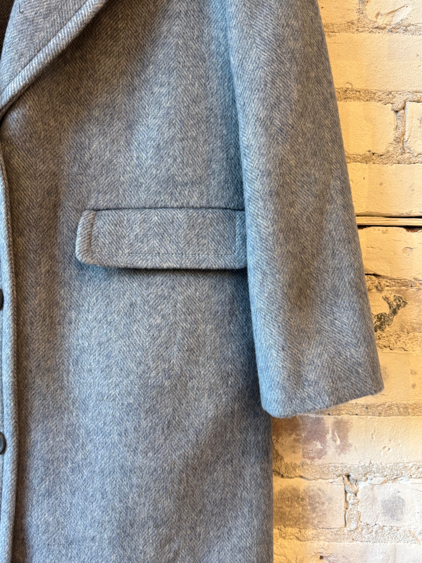 Women's sky blue wool coat by Aspesi, showcasing a stylish, tailored design with a collar and button closure.