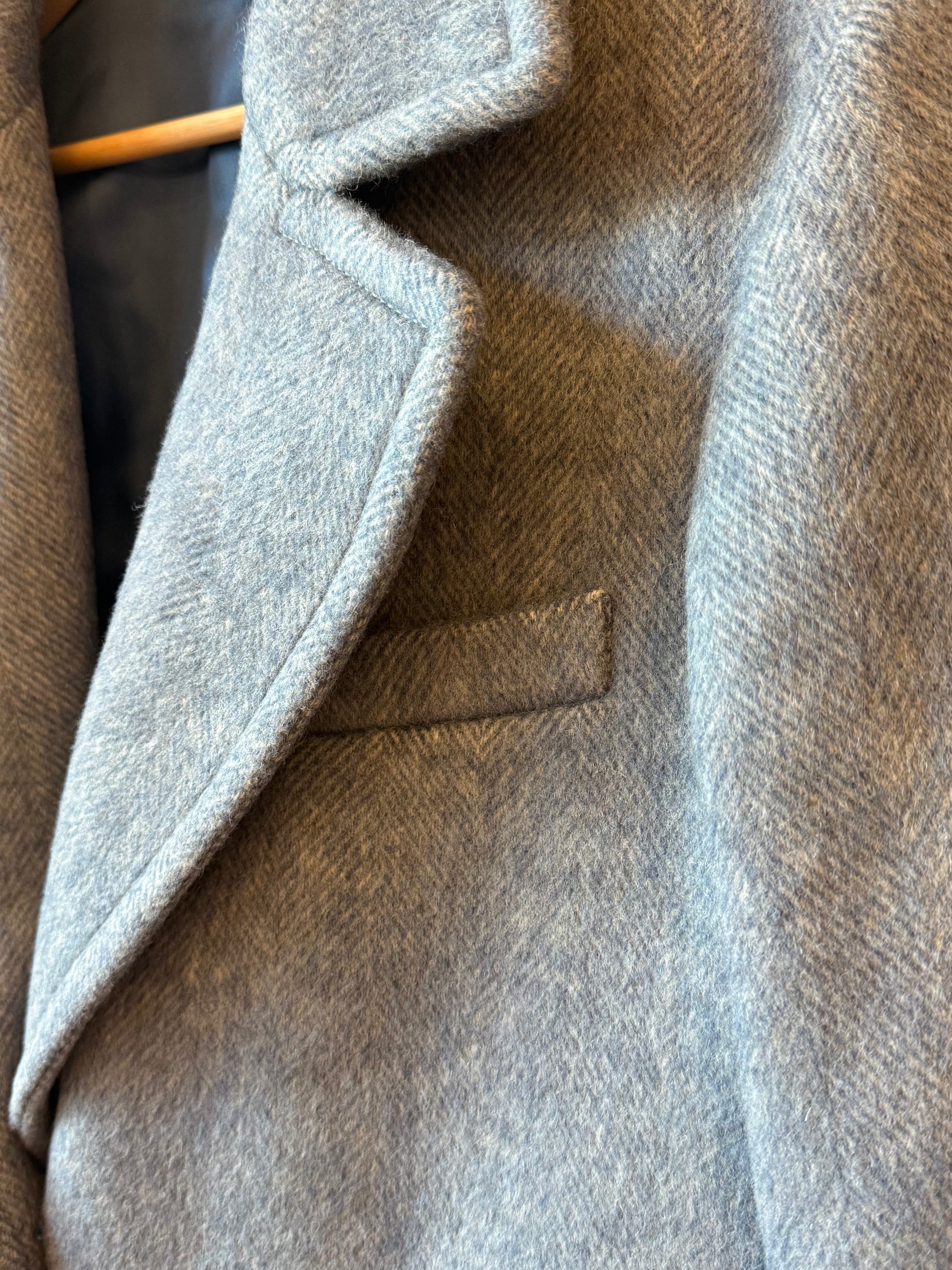 Women's sky blue wool coat by Aspesi, showcasing a stylish, tailored design with lapels and long sleeves.