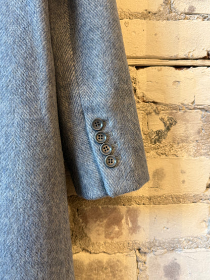 Sky blue women's wool coat by Aspesi, shown hanging on a hanger with front view and tailored fit.