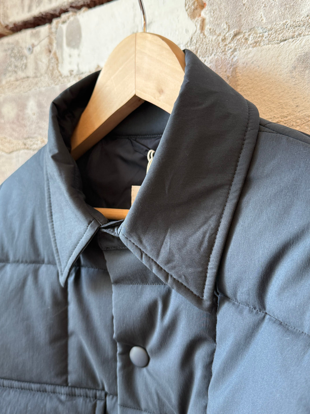 Men's navy padded quilted overshirt by Aspesi, featuring a padded, quilted design and casual fit, perfect for layering and warmth.