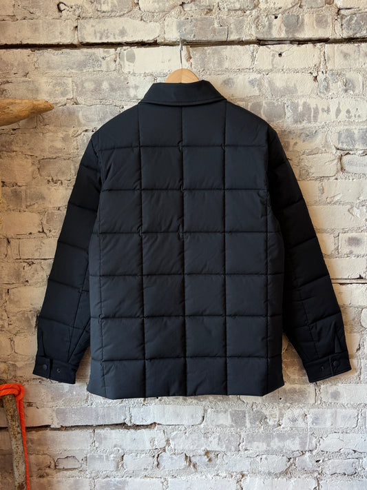 Men's navy padded quilted overshirt by Aspesi, featuring a quilted design and padded construction for warmth and style.