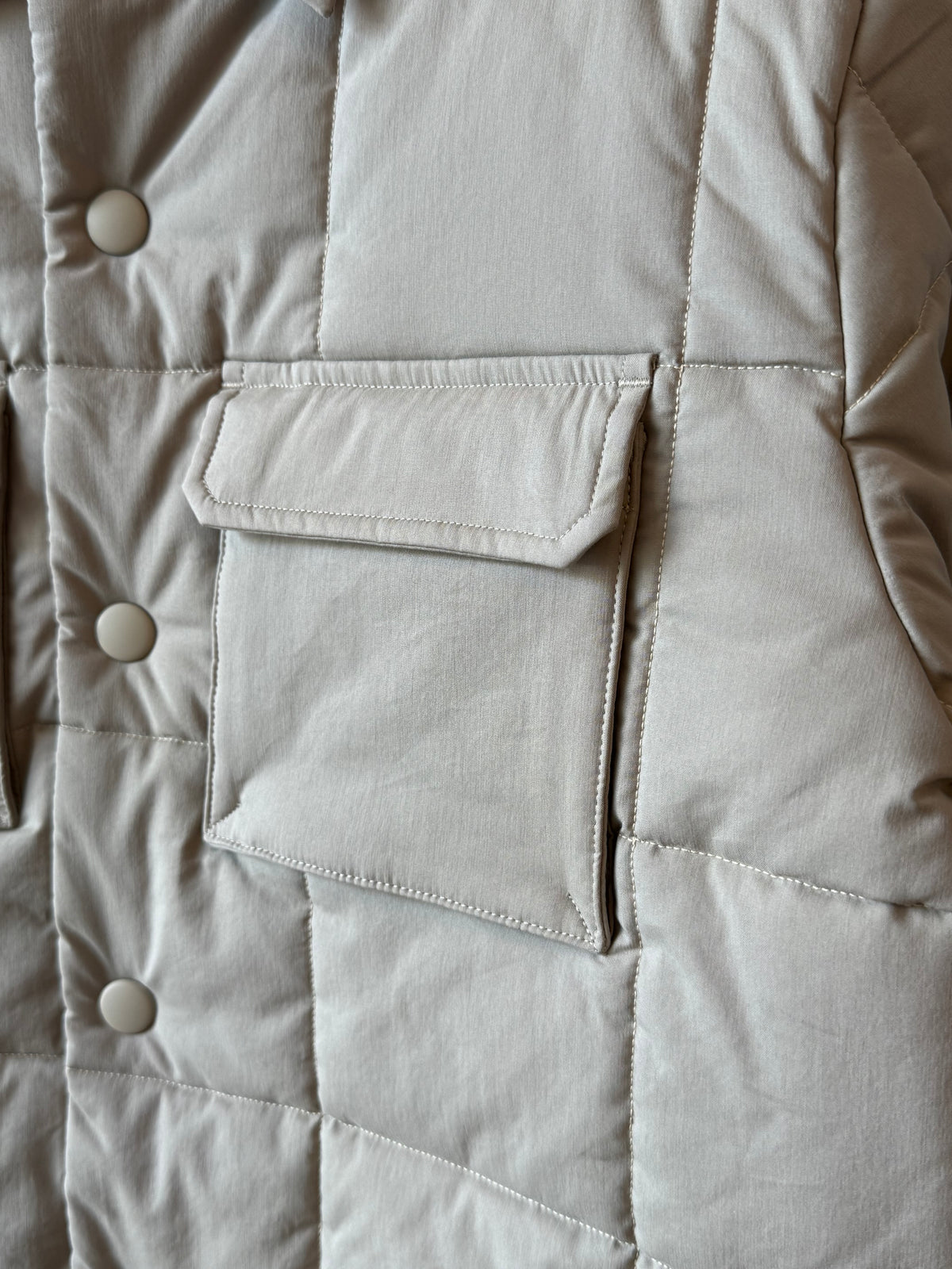 Men's padded quilted overshirt in colonial beige by Aspesi, featuring a padded, quilted design ideal for casual layering.